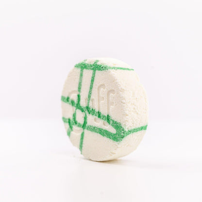 Buff City Soap's lemongrass + eucalyptus scented shower fizzy soap with buff written on its side