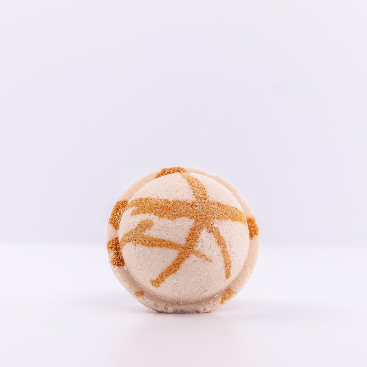 view of the top of a Oatmeal + Honey Bath Bomb